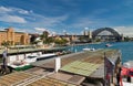 SYDNEY - OCTOBER 2015: City Harbor skyline on a sunny day. The city attracts 20 million people annually Royalty Free Stock Photo