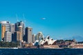 Sydney Opera House and Central Business District with Qantas plane