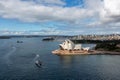 Sydney Opera House and ferry boats on a sunny day, view from the Harbour Bridge tower in Sydney