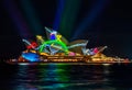 Sydney Opera House illuminated with vibrant moving graphics
