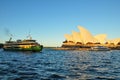 Sydney opera house, is a multi-venue performing arts centre with Green ferry boat in Sydney harbour. Royalty Free Stock Photo