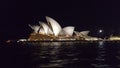 Sydney Opera House by night seen from the Mosman ferry, Sydney, NSW, Australia