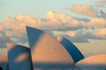 Sydney Opera House\'s iconic sails under vibrant sunset clouds Royalty Free Stock Photo
