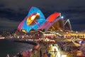 The Sydney Opera House sails illuminated by colourful light in annual vivid festival