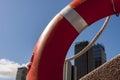 Sydney skyscrapers behind red lifebuoy. Sydney, Australia