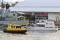 Sydney Yellow Water taxi passing yacht, Destroyer HMAS Vampire s Royalty Free Stock Photo