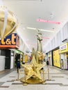 Sylvia park shopping mall decorate with a huge golden deer and star in the hall.