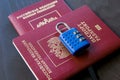 Symbol of anti-Russian sanctions. Two Russian passports locked to padlock