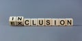 Symbol for a better inclusion. Inverted cube and changed word exclusion to inclusion. Beautiful grey background. Copy space