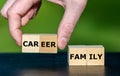 Symbol for choosing against a family and for a career. Wooden cubes form the words career and family