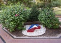 Symbol for the City of Plano, Texas, in a bed of white rocks in Haggard Park. Royalty Free Stock Photo
