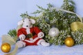 Symbol of 2020 on the eastern calendar. Cute white rat in a red Santa Claus costume near the juniper branch and golden