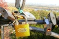 A yellow lock as a symbol of endless love and devotion on the background of noble city, Kiev.