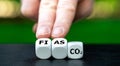 Symbol for failed CO2 reduction. Cubes form the expression 'fiasco' and 'co2'.