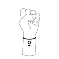 Symbol of feminism raised fist. Hand with a bracelet in the form of a mirror of Venus. Happy Women`s Day. March 8.