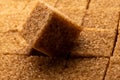 A symbol of food crisis, an full pack of brown sugar cubes highlights the divide between those who have access to