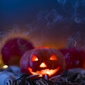 Jack O Lantern Halloween pumpkins, burning candles. Symbol of halloween