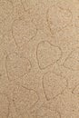 Symbol of heart is drawn on clean sand Royalty Free Stock Photo