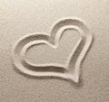 The symbol of heart is drawn on sand Royalty Free Stock Photo