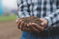 Symbol heart earth day. Handful of dirt hands heart shape. Farm organic earth. Farmer hands soil ground earth dirt garden soil Royalty Free Stock Photo