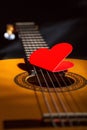 Guitar in the evening lighting on Valentine`s Day, Russia Royalty Free Stock Photo