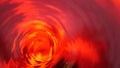 Symbol of hell, inferno and infinity. Red liquid hypnotic looped aqua swirl turning. Meditative luminous whirlpool. Mesmerising