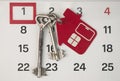 The symbol of the house is pinned to the calendar. Real estate purchase , mortgage loan repayment time, housing tax payment Royalty Free Stock Photo