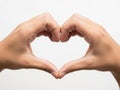 Symbol of love and affection formed by hands Royalty Free Stock Photo
