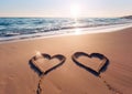 Symbol of love on the beach background.A romantic honeymoon or valentines day Royalty Free Stock Photo