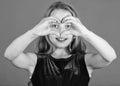 Symbol of love. Kid adorable girl with long hair smiling face show heart gesture to you. Celebrate valentines day. Love Royalty Free Stock Photo