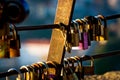 The tradition of attaching lovelocks to a bridge fence as a symbol of a couple\'s unwavering love and affection