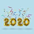 Symbol 2020 made of gold balloons with colorful streamers. Minimal Christmas or New Year concept