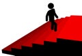 Symbol man climbs up to top of red carpet stairs Royalty Free Stock Photo