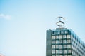 Berlin, 03 October 2017: The symbol of Mercedes Benz on the roof of the central office building of the international