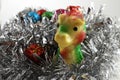 symbol of the New Year - a dragon against the background of New Year\'s tinsel, balls and Christmas tree decorations Royalty Free Stock Photo