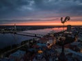 Symbol of old Riga town - golden cockerel, rooster topping bell tower of Riga