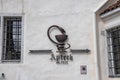 Symbol of oldest chemist shop on wall in historic town at capital city