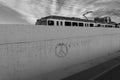 Symbol of peace marked on a cement wall with a train in the background Calgary, Alberta Royalty Free Stock Photo