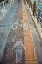 Symbol of pedestrians and bicycles along the Chao Phraya River, Bangkok, Thailand