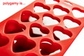 Symbol of polygamy. Red container for ice form of hearts Royalty Free Stock Photo