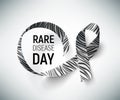 Symbol of rare disease awareness day, ribbon with zebra-print.