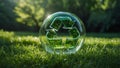 Green recycle symbol made of translucent glass set against lush verdant landscape