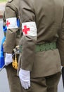 symbol of red cross on the uniform of the doctors