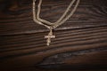 Symbol of religion, a Christian Orthodox cross on a chain around the neck Royalty Free Stock Photo