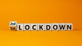 Symbol for a second lockdown. Turned cubes and changed the expression `1st lockdown` to `2nd lockdown`. Beautiful orange Royalty Free Stock Photo