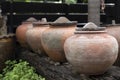 Symbol of several jars with wooden lids on top