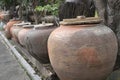 Symbol of several jars with wooden lids on top