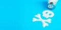 Symbol Skull and crossbones written salt. Salt kills. Crumbled on a blue background Royalty Free Stock Photo