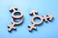 Symbol of transgender and gender symbols of man and woman of tree on blue Royalty Free Stock Photo