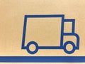 Symbol of truck on cardboard